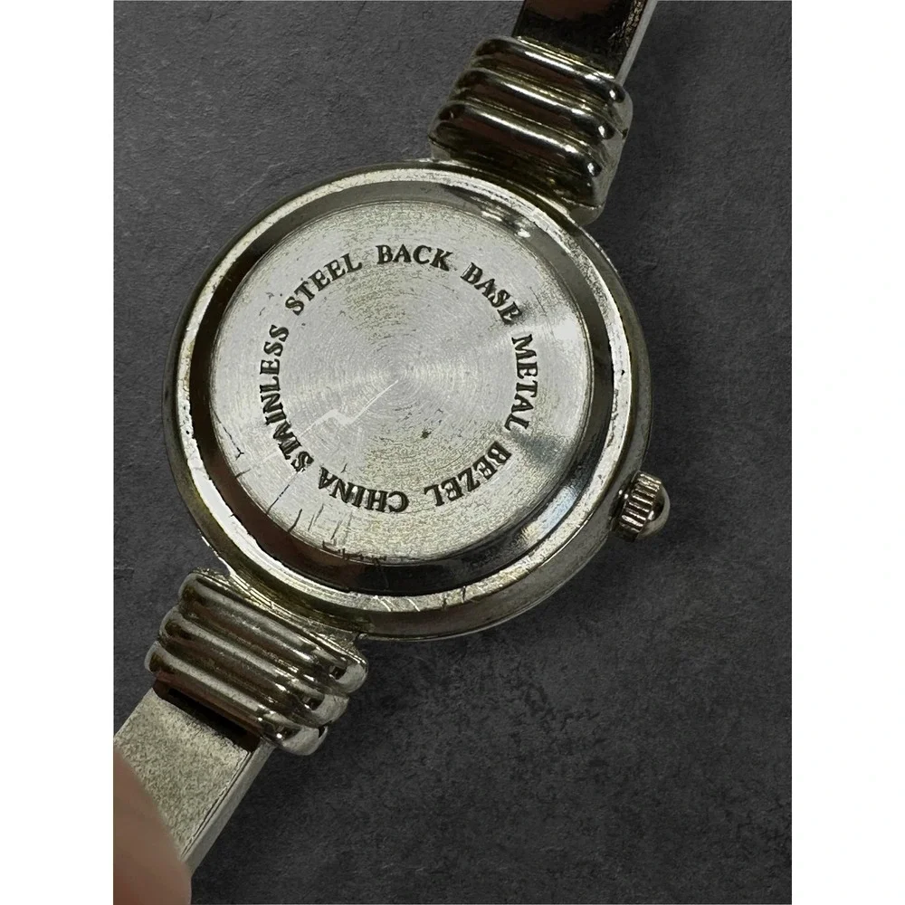Snowflake Cuff Watch Womens Silver Tone Vintage Quartz Bangle